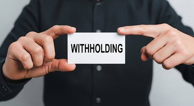 Withholding tax concept, businessman holding white card with withholding text, financial and accounting legal document notification