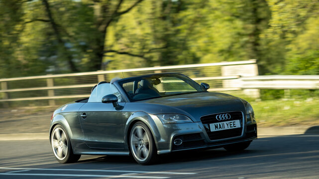 Milton Keynes,Bucks,UK - Apr 24th 2026:  2011 Audi tt convertible car driving on a British road