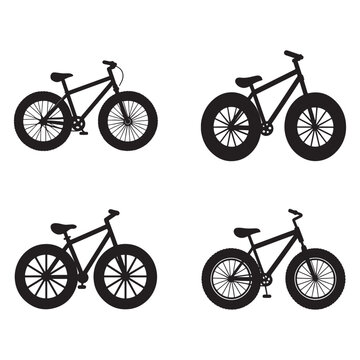 Four black silhouettes of bicycles with different wheel designs on white background  various bike models and wheel patterns