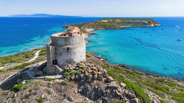 Aerial view of the historic Torre di San Giovanni watchtower on the Sinis peninsula near Tharros, Cabras, Sardinia, Italy