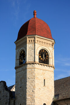 A limestone clock tower at Williams College campus in Williamstown, Massachusetts