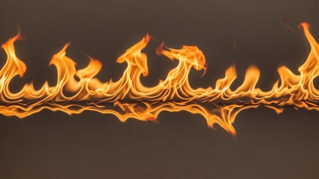 Vibrant orange flames on dark background.