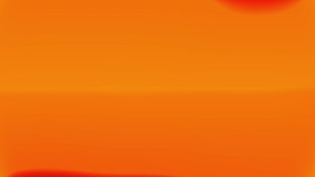 Abstract orange gradient background with red glowing light transitions and soft fluid motion in dynamic cinematic clip featuring warm color palette with smooth blurring and glowing.