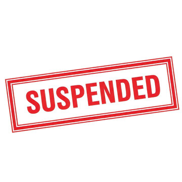 A bold red stamp with the word suspended printed across it.