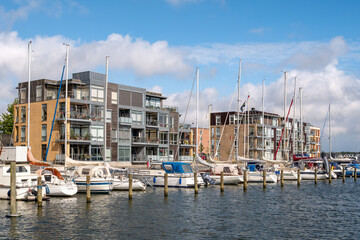 Waterfront apartment buildings and marina on Pakhuskajen, Haderslev Marina North, South Jutland, Southern Denmark © TasfotoNL