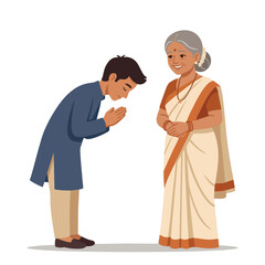 Obraz premium Indian boy bowing in respect to an elderly woman greeting with traditional namaste hand gesture