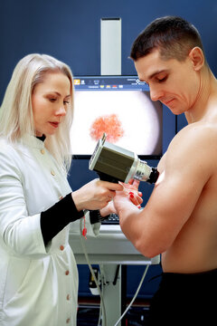 Digital dermatoscopy. Early diagnosis and prevention of skin cancer. Doctor and patient.