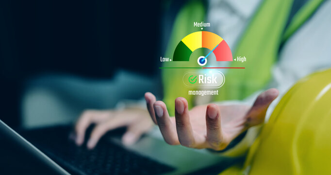 Risk analysis concept. Engineer holding virtual gauge showing low medium high levels, risk management assessment control, safety monitoring evaluation, decision making industrial process