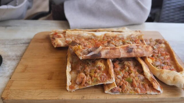 Enjoying traditional pide in Istanbul with friends