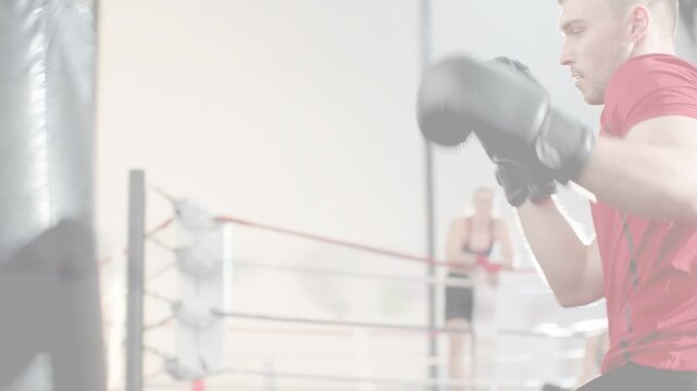 Glitches clearing, boxer shadowboxing then stepping in, landing punches on heavy bag for training