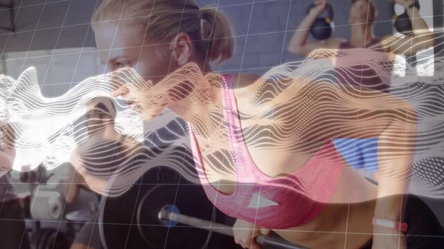 Female athlete in gym gripping barbell and pulling bent rows for strength waveform tracking reps