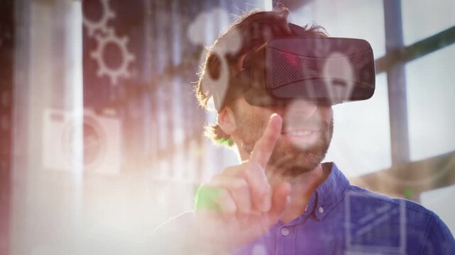 Man wearing VR headset raising finger, selecting cog WiFi map icons over windows, showing tech demo