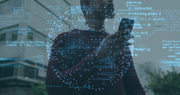 Holding phone, man in maroon sweater looking upward at office facade, with holographic Python code