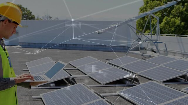 Tech opening laptop and typing by solar panels, monitoring as HUD links mapping panels to laptop