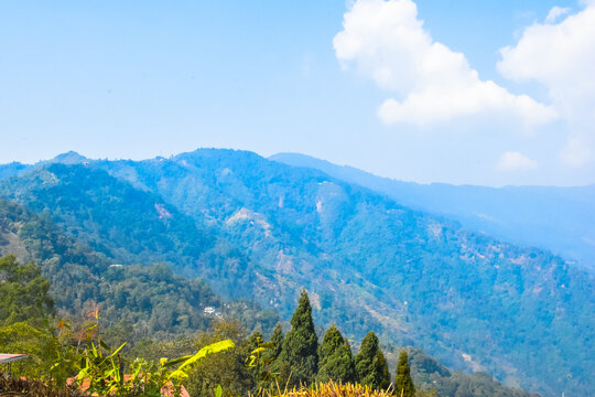 Panoramic view of Sittong, Darjeeling, West Bengal, India. Panoramic view of blue mountains peaks ridge.