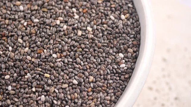Chia seeds in a bowl at a kitchen table