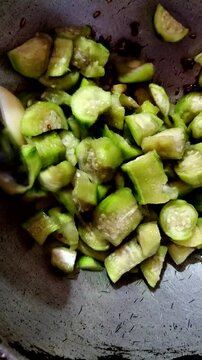 Adding Fresh Chopped Sponge Gourd (Turai) to the Pan Healthy Veggie Prep