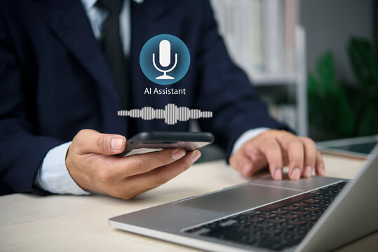 Innovative voice control technology businessman using AI assistant smartphone microphone icon sound wave waveform laptop workplace smart communication natural language processing.