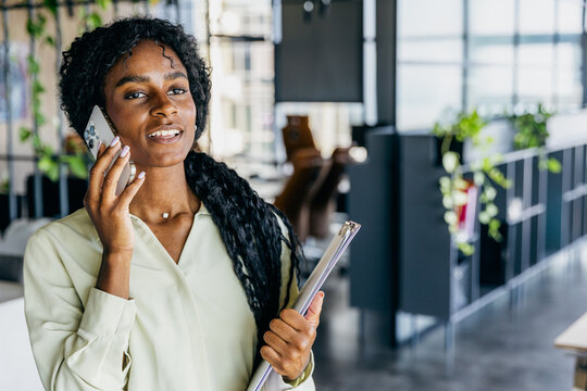 Reassuring black recruiter conducting hybrid interview