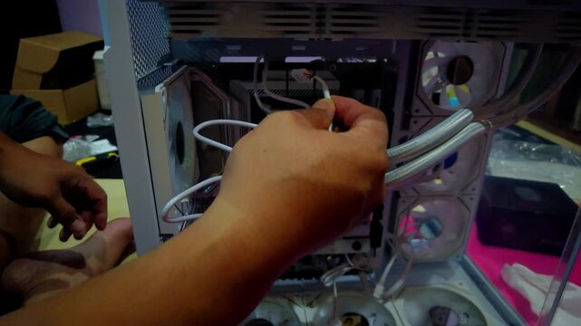 Malaysia, Bangi&mdash;October 10, 2025: A hand assembling the computer CPU.