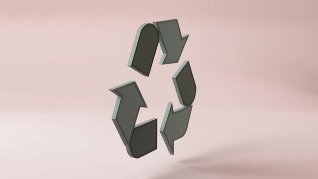Tracking shot of recycling symbol rotating and rising while floating in minimal pink studio backdrop with soft pastel lighting