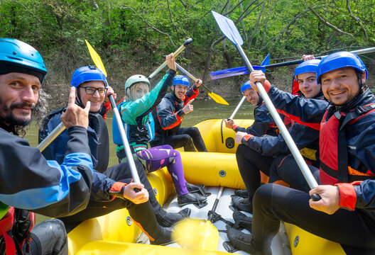  Happy rafting team posing for picture