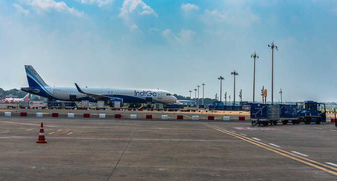 November: 01,2025. This image captures an IndiGo Airbus A320 aircraft parked at a terminal gate during ground operations. 