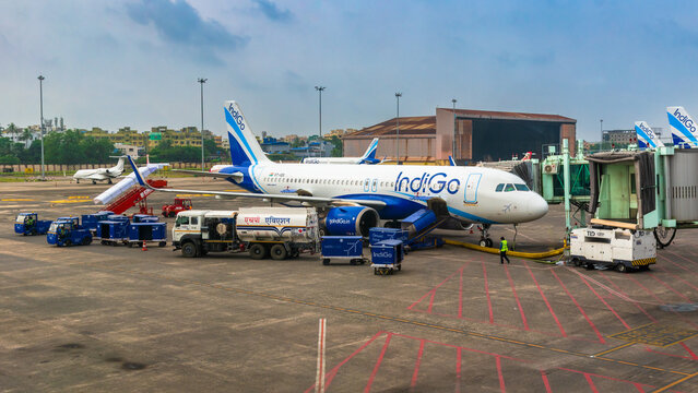 November: 01,2025. This image captures an IndiGo Airbus A320 aircraft parked at a terminal gate during ground operations. 