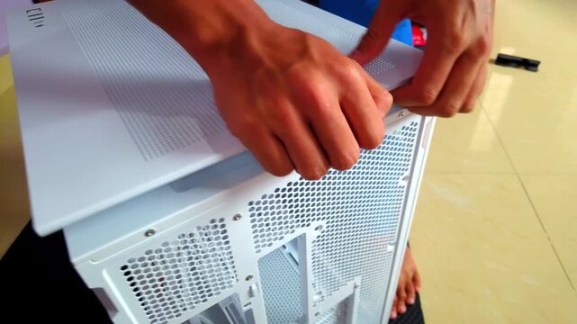 Taking off the top white desktop chassis box.