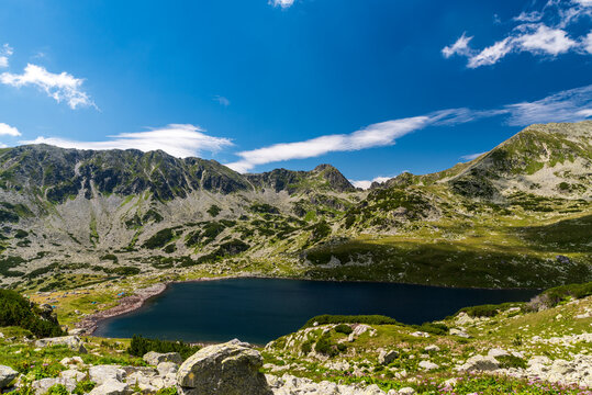 Bucura lake with peaks around in Retezat mountains in Romania