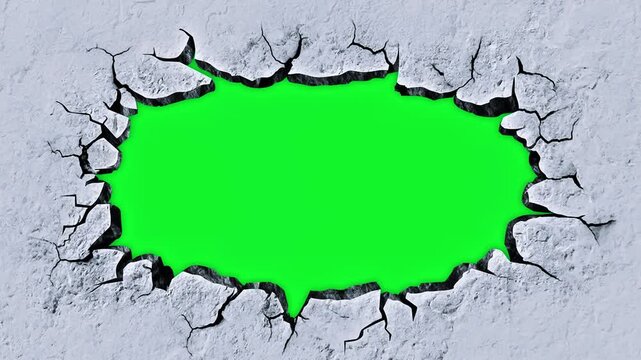 Cracked Concrete Wall Breaking to Reveal Green Screen Chroma Key Background