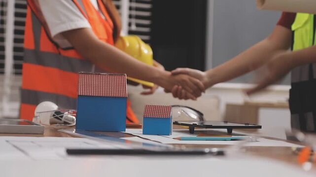 Architecture drawing on architectural project business architecture building construction Colleagues designer Planning Design on blueprint and compasses
