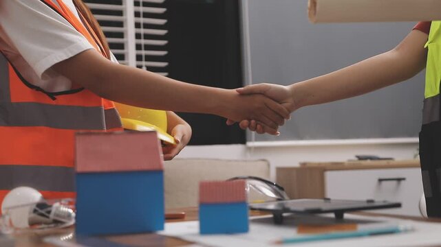 Architecture drawing on architectural project business architecture building construction Colleagues designer Planning Design on blueprint and compasses