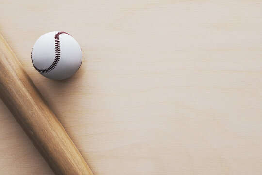 Baseball ball and bat on a light wooden background with wide empty space for modern sport poster design, clean templates, banners, and creative branding needs. 3D Rendering