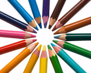 Fototapeta premium Colorful Pencils Arranged in Circle on White Background, Art Supplies