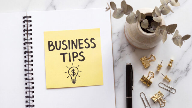 Business tips and financial idea concept for entrepreneurial planning strategy and revenue growth motivation in productive professional workspace with organizational stationery