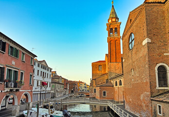 Fototapeta premium Vena Canal and Basilica of Saint James Apostle in Chioggia Italy