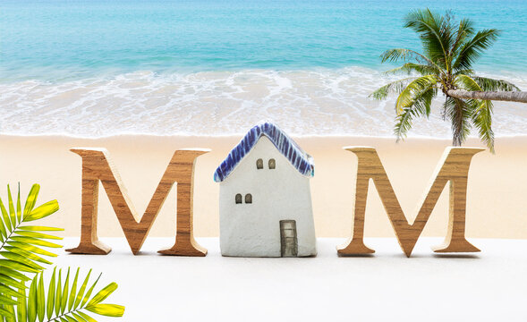 Mother's day card tropical style background idea, wooden font with house model over tropical beach background, mothe's day gift