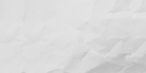 Fototapeta premium This image features close-up panoramic view of crumpled white cardboard surface. The interplay of light and shadow highlights the intricate network of creases folds creating dynamic tactile texture