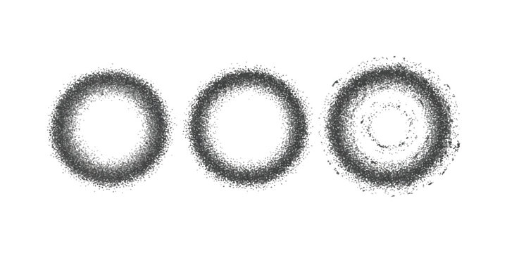 Three black circles made of scattered ink dots and rough grain texture in a minimalist graphic design style