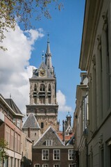 Fototapeta premium Gothic tower of the church Oude Kerk (Old Church) in Delft, Netherlands