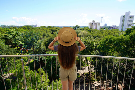 Tourism in Mato Grosso, Brazil. Young traveler woman on Cuiaba belvedere, Mato Grosso, Brazil.