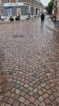 Wet Cobblestone Town Square on Rainy Summer Day in Ribe, Denmark