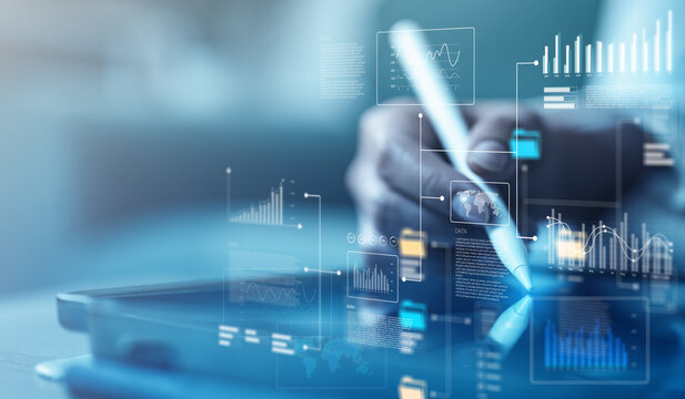 User analyzing data on digital dashboard with charts and graphs, representing analytics, business intelligence, and data driven decision making in modern technology.