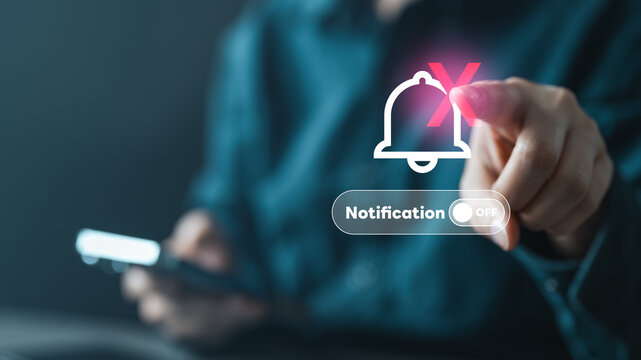 User turning off notifications on smartphone with toggle interface, illustrating do not disturb mode, alert control, and digital focus management in modern lifestyle.