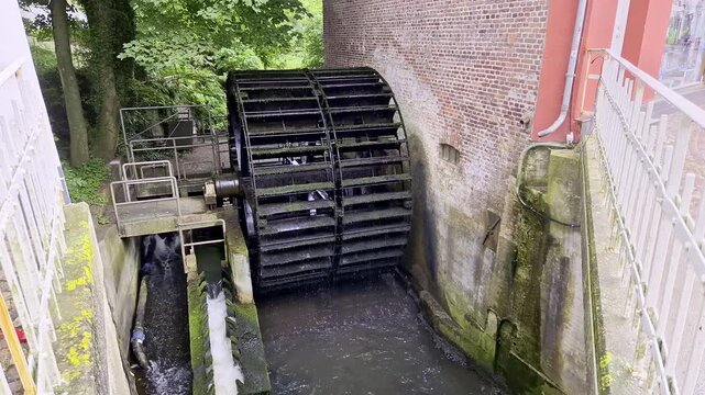 Spinning Water Wheel at Historic Ribe Watermill, Denmark, Summer