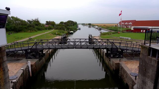 Open Lock Gate on Ribe River Canal with Harbor Building, Denmark