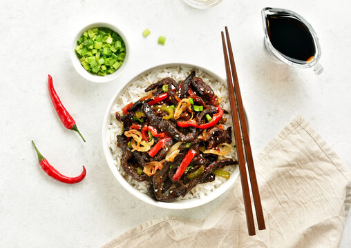 Crispy chilli beef in sweet and spicy chilli sauce with basmati