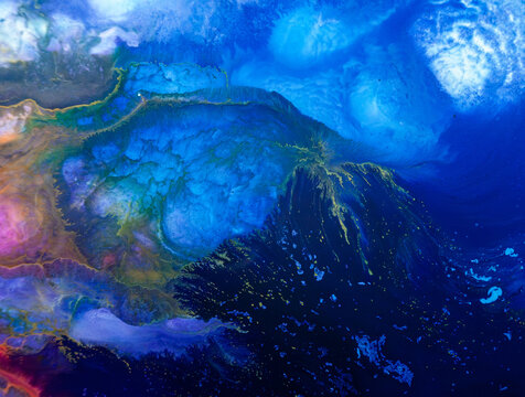 Colors blend in a vibrant depiction of ocean waves and underwater life in a digital abstract art piece