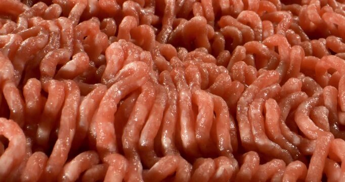 Closeup Raw Ground Beef Texture Glistening Showcasing Moist Tubular Strands